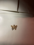 Butterfly pendant set in 14 karat gold