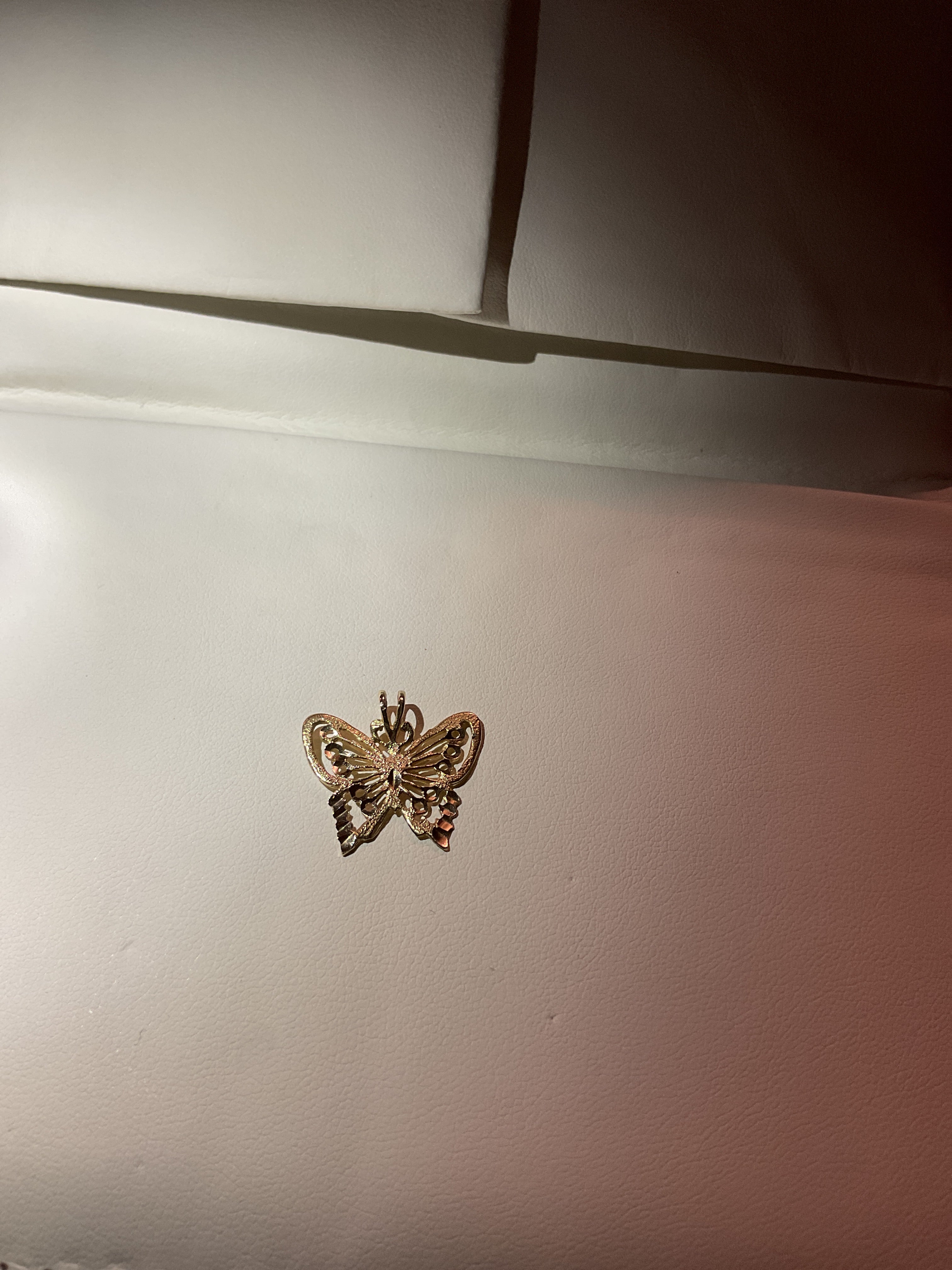 Butterfly pendant set in 14 karat gold