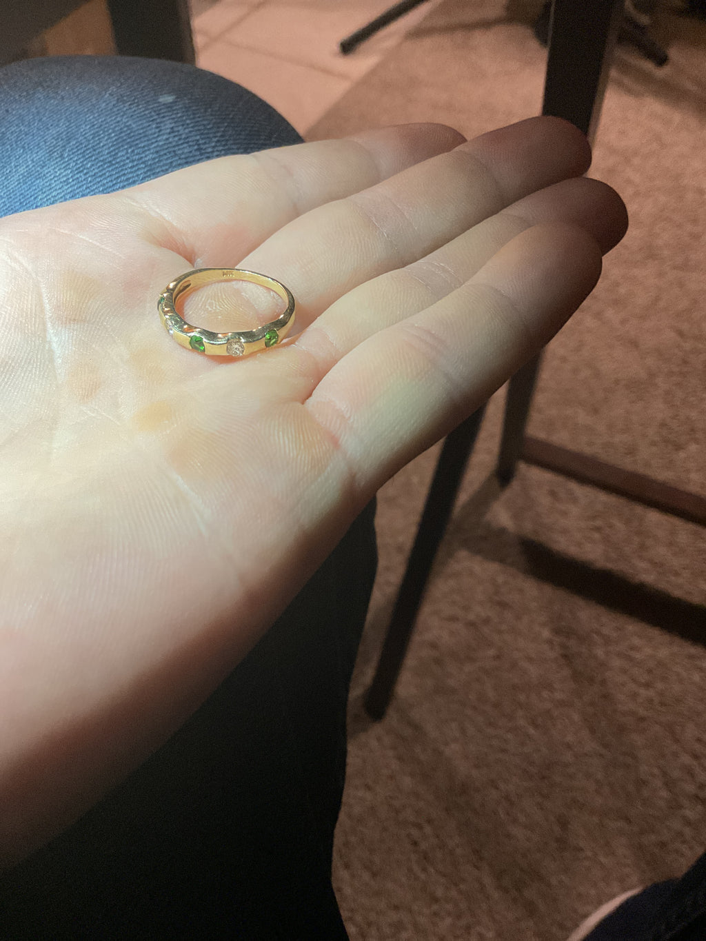 Ring with 3 tsavorite stones and 2 natural diamonds set in 14k Gold