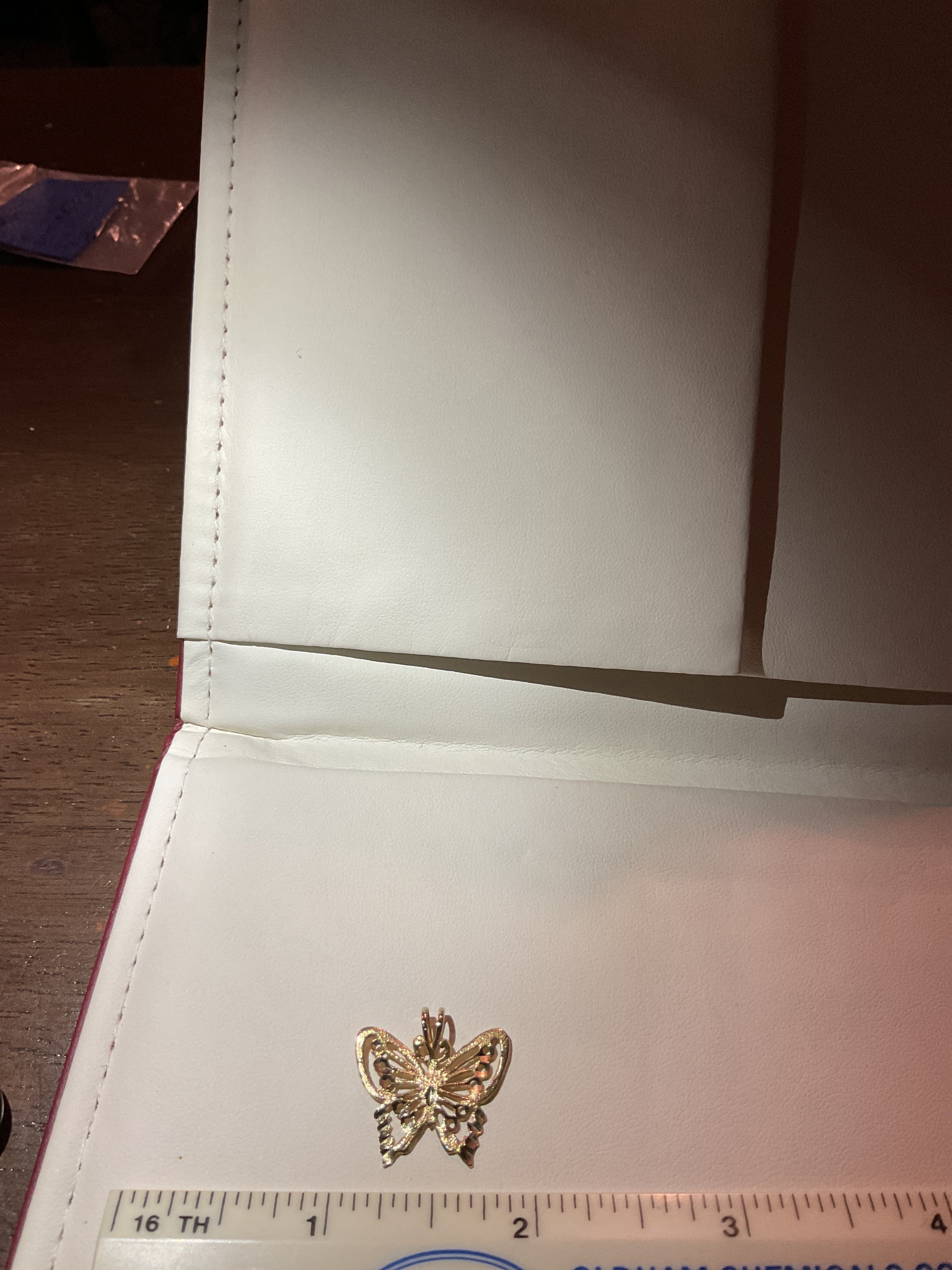Butterfly pendant set in 14 karat gold