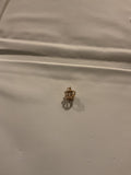 20K solid gold crown 1.3 grams