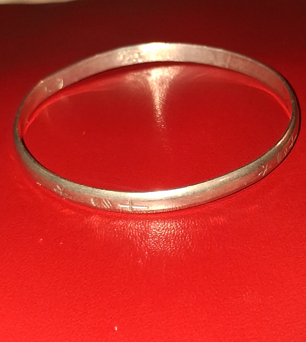 Estate bangle style bracelet. 2-1/2 inches wide. It is stamped 925 silver, but upon testing it contains no precious metals. Its still a beautiful piece at an affordable price.