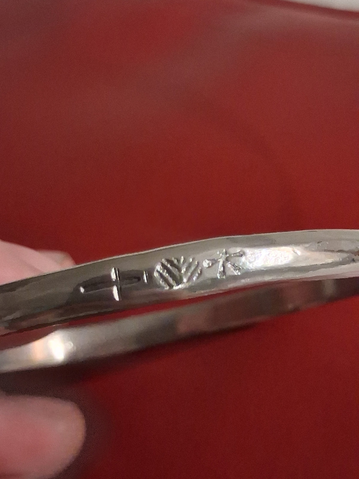 Estate bangle style bracelet. 2-1/2 inches wide. It is stamped 925 silver, but upon testing it contains no precious metals. Its still a beautiful piece at an affordable price.