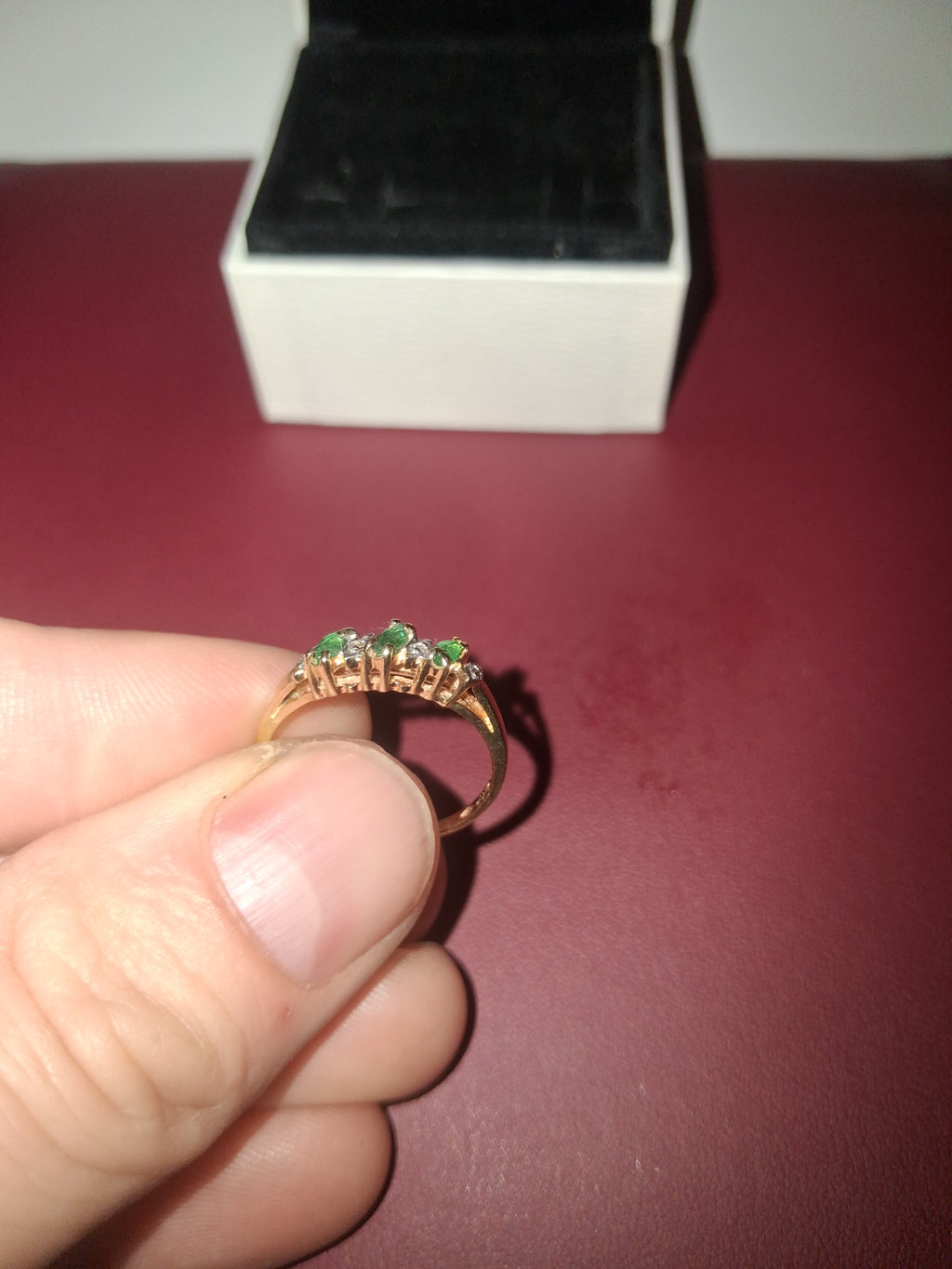 3 natural Emeralds around 0.55 CTW/ 3 -si clarity, natural diamonds. 💎 set in 10k yellow gold. Weighs 1.7 grams/ size 7