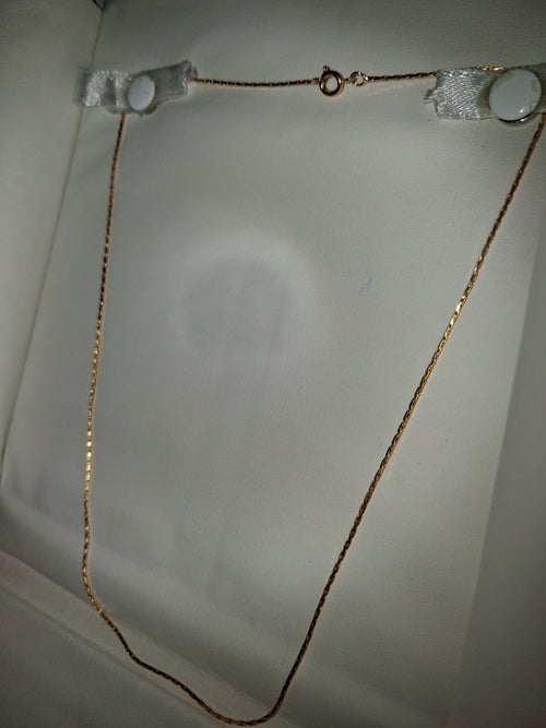 18 inch gold-tone necklace. "costume"