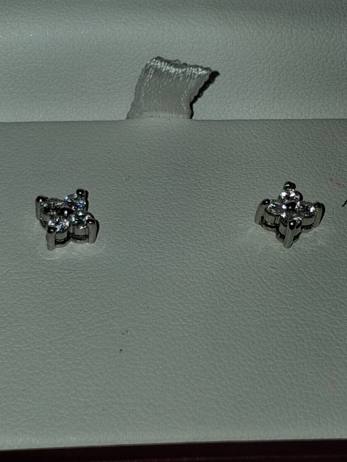 Platinum earrings set high quality natural diamonds 1.4 grams total weight. 💎0.25–0.35 ct per earring → ~0.50–0.70 carat total weight (CTW) for the pair. I had posts moved to middle of earrings so they are unisex.