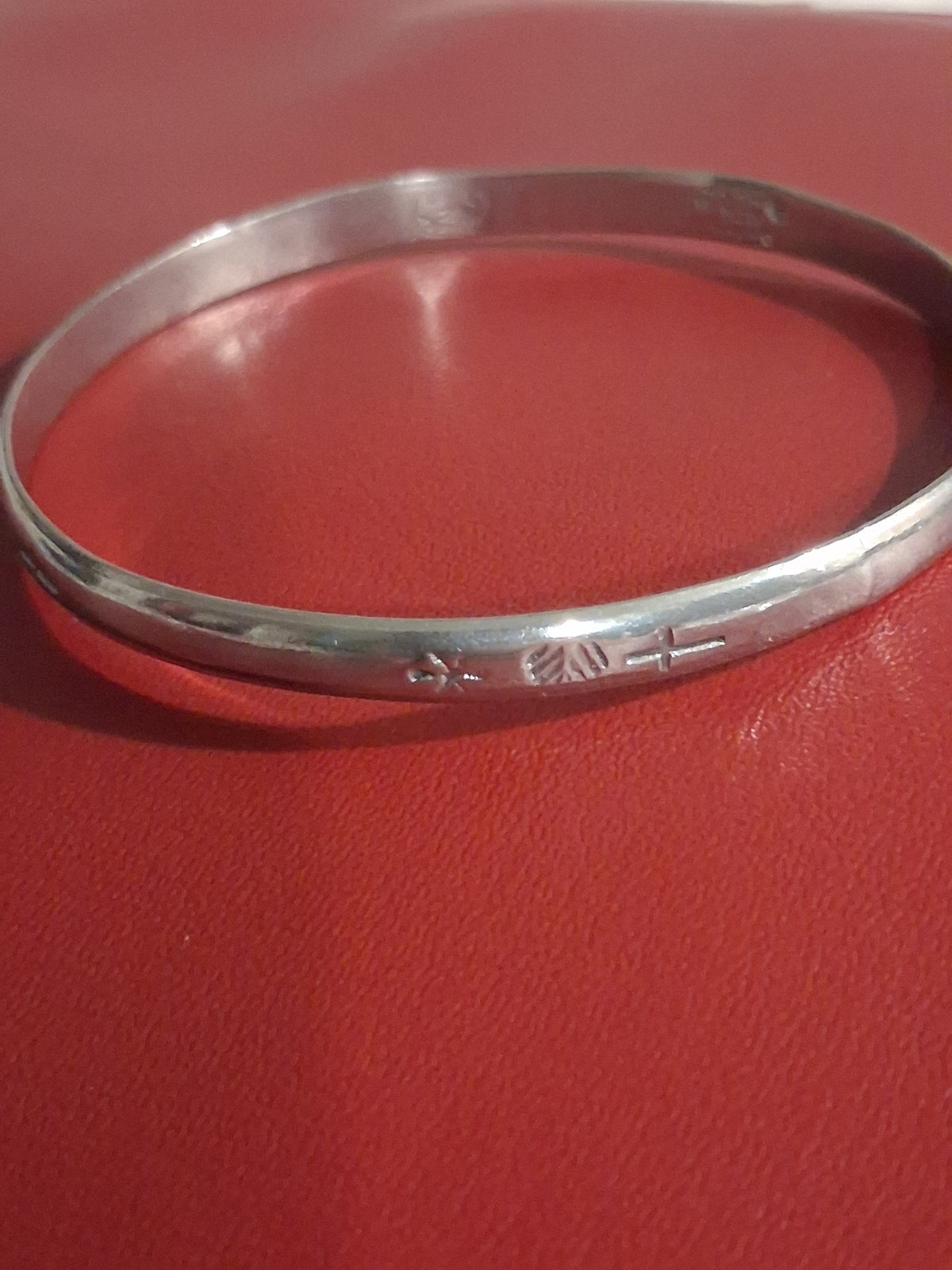 Estate bangle style bracelet. 2-1/2 inches wide. It is stamped 925 silver, but upon testing it contains no precious metals. Its still a beautiful piece at an affordable price.