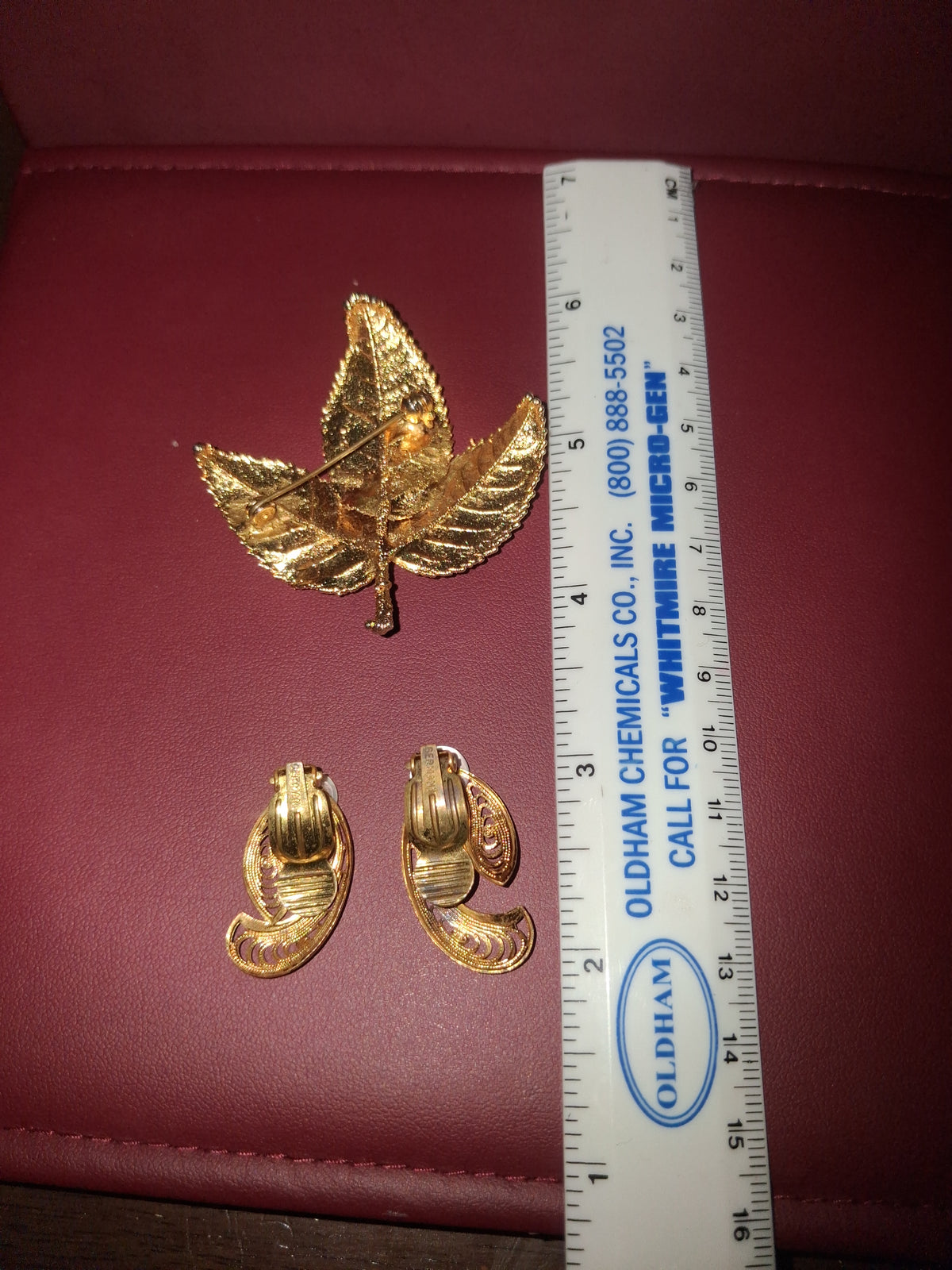 Gold plated broach/clip on womans earrings set.