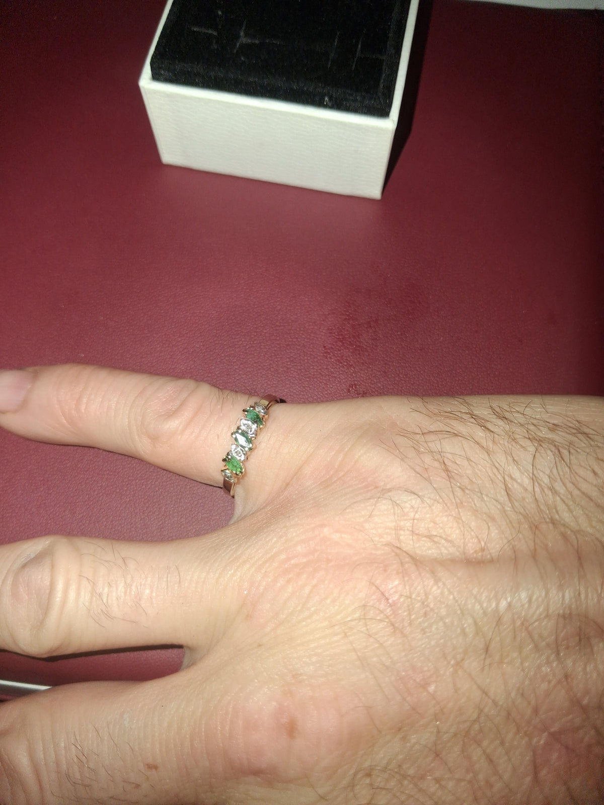 3 natural Emeralds around 0.55 CTW/ 3 -si clarity, natural diamonds. 💎 set in 10k yellow gold. Weighs 1.7 grams/ size 7
