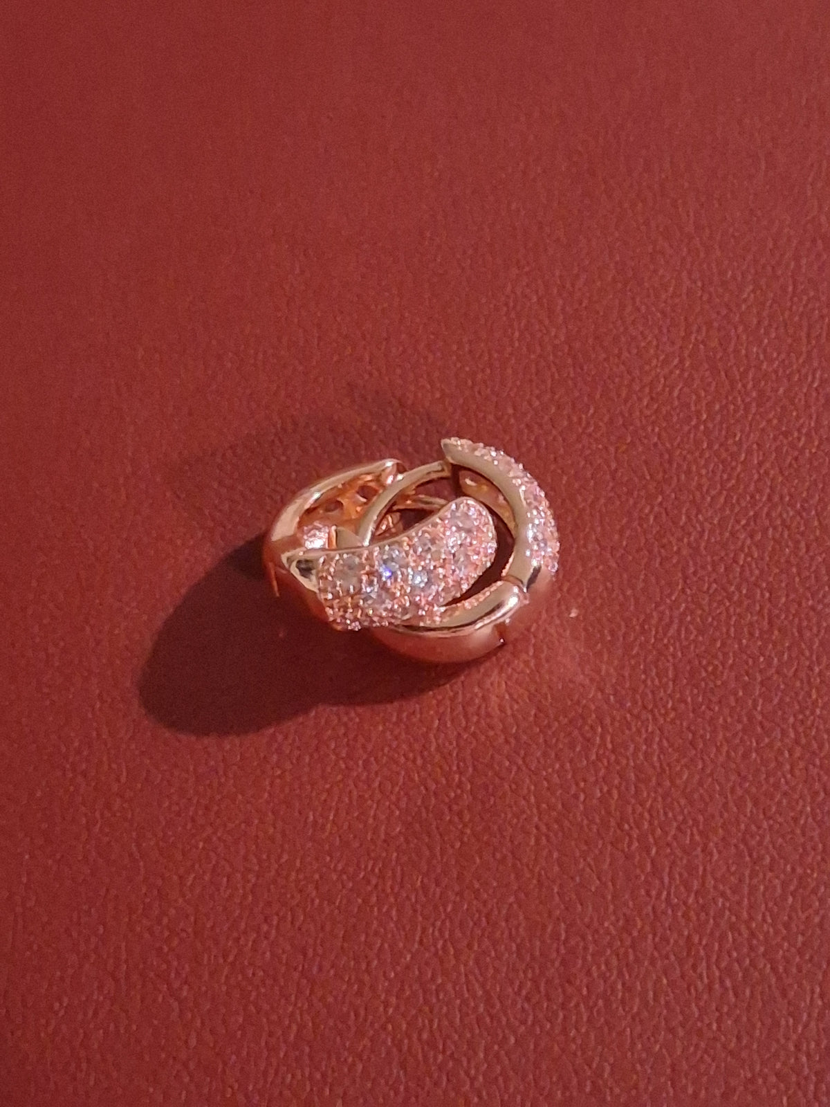 New & Beautiful woman's hoop earrings. "Costume" stones are cz.